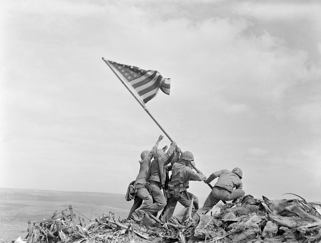 Marines raising flag on Mt Suribachi during the Battle of Iwo Jima in 1945.