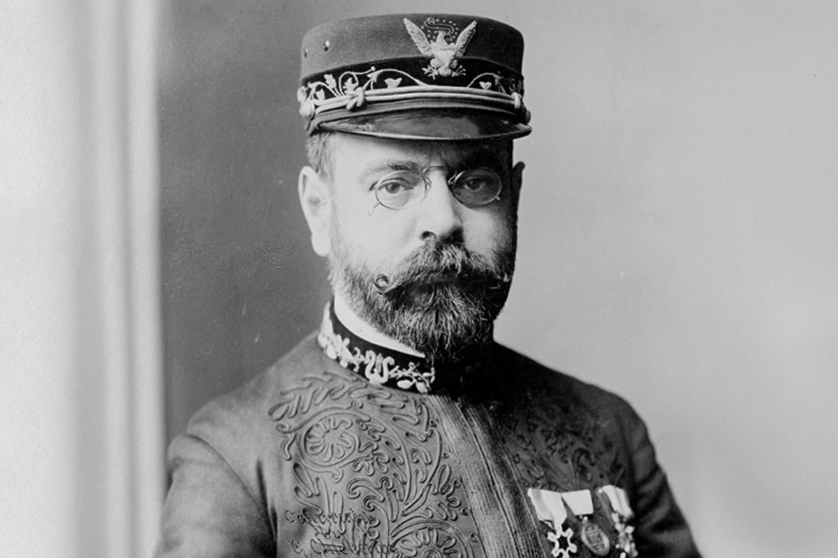John Philip Sousa in historic Marine Corps dress uniform with ornate military decorations and ceremonial cap.